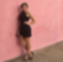 Sierra Dawn beside pink wall light.jpg