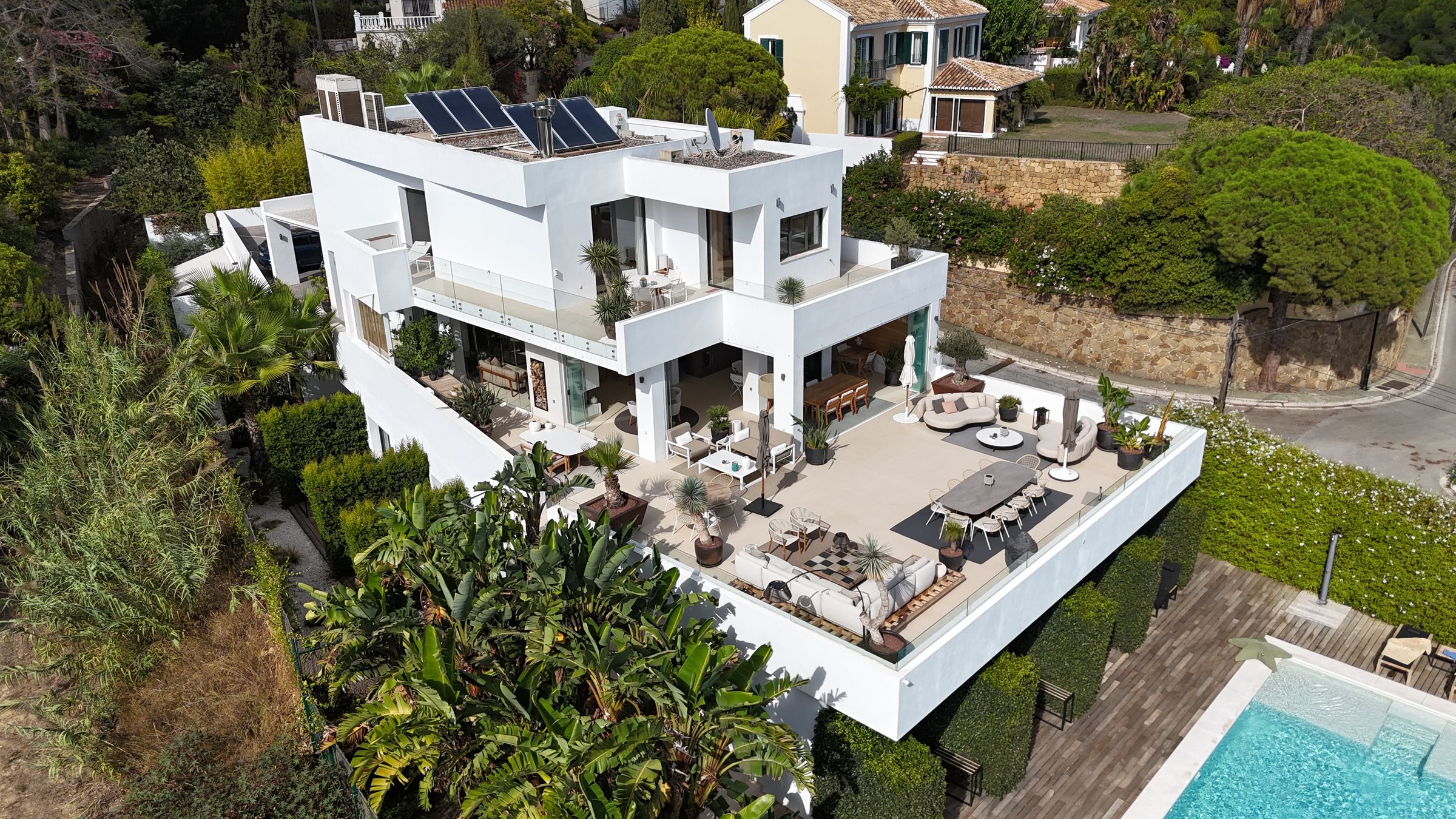 Aerial view of a villa with pool and garden in Marbella
