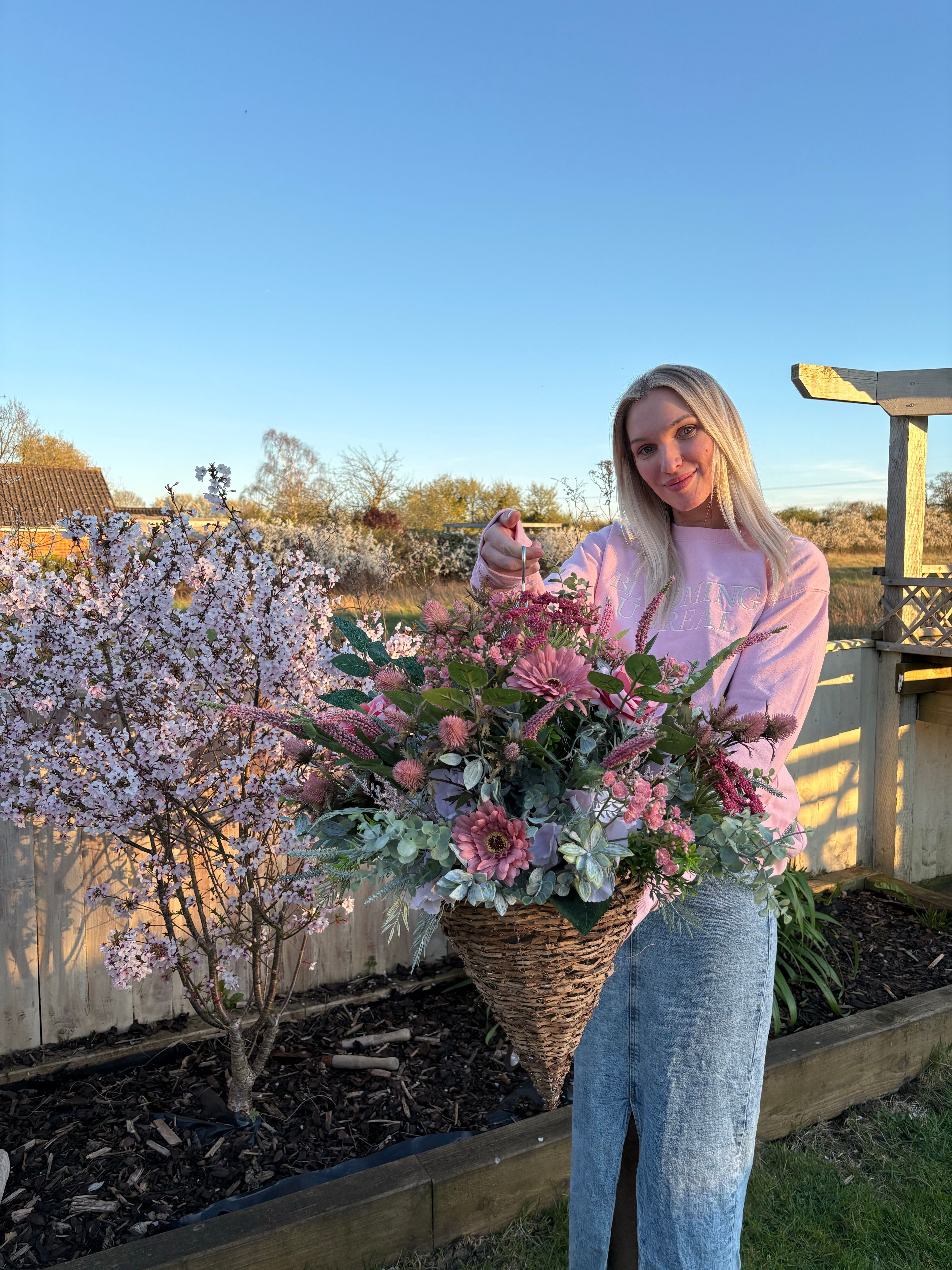 Pink and foliage hanging basket 