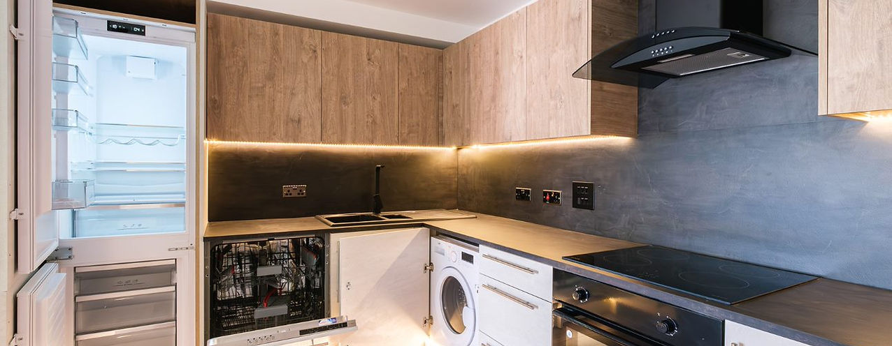 Modern apartment kitchen: integrated appliances, wood cabinets