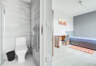 Modern apartment bathroom and bedroom