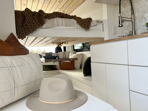 Custom campervan build with elevator bed