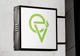 Sign mockup featuring EV logo redesign for Essential Vapors & CBD