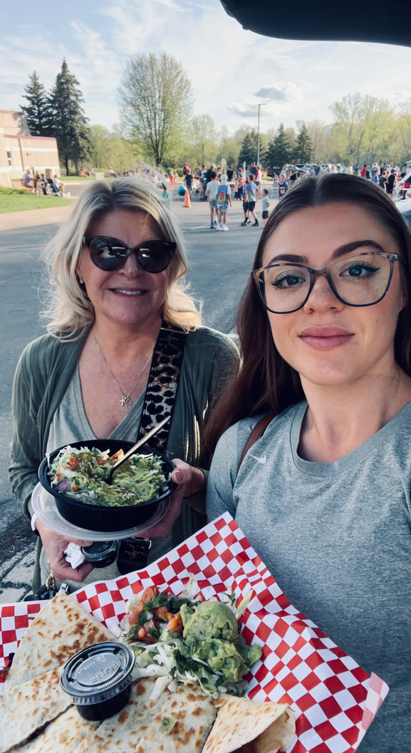 Enjoying food with my mom from the food truck event that the Mahtomedi school's put together for the community.