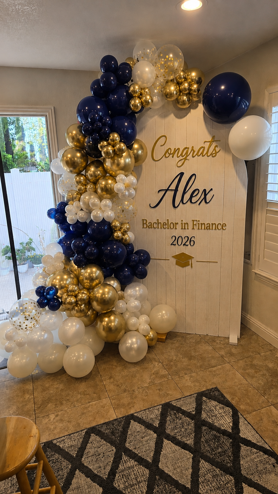 Birthday balloon display with gold and black decorations for a San Jose celebration