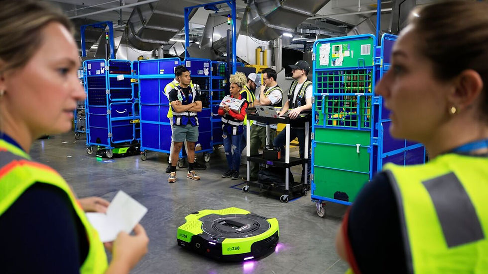 Amazon warehouse employees working alongside an autonomous robot at a European fulfillment center. Image: Amazon / aboutamazon.com