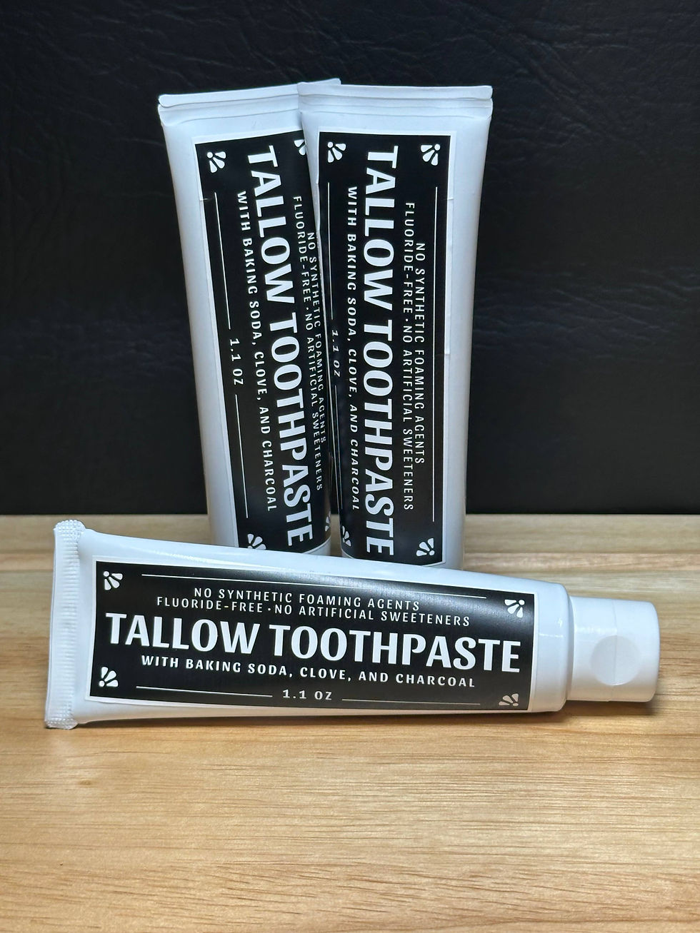Tallow toothpaste with clove and activated charcoal