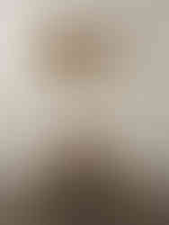 A blank wall staged with an entry bench and woven baskets