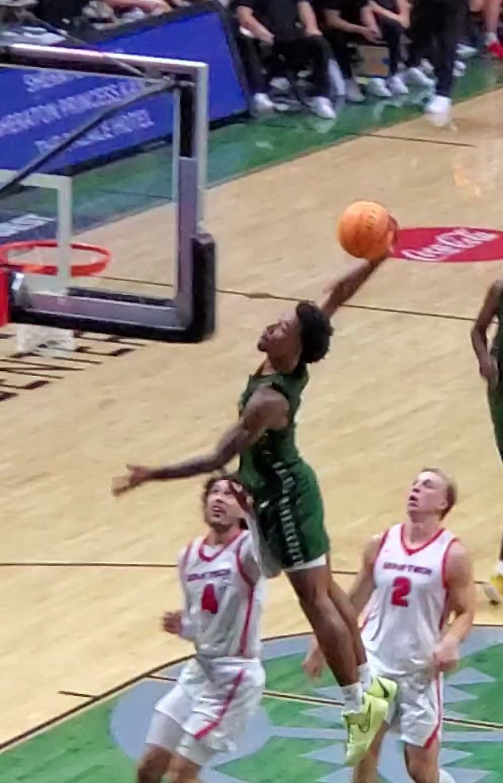 UH's Dre Bullock goes for a slam dunk against Utah Tech!