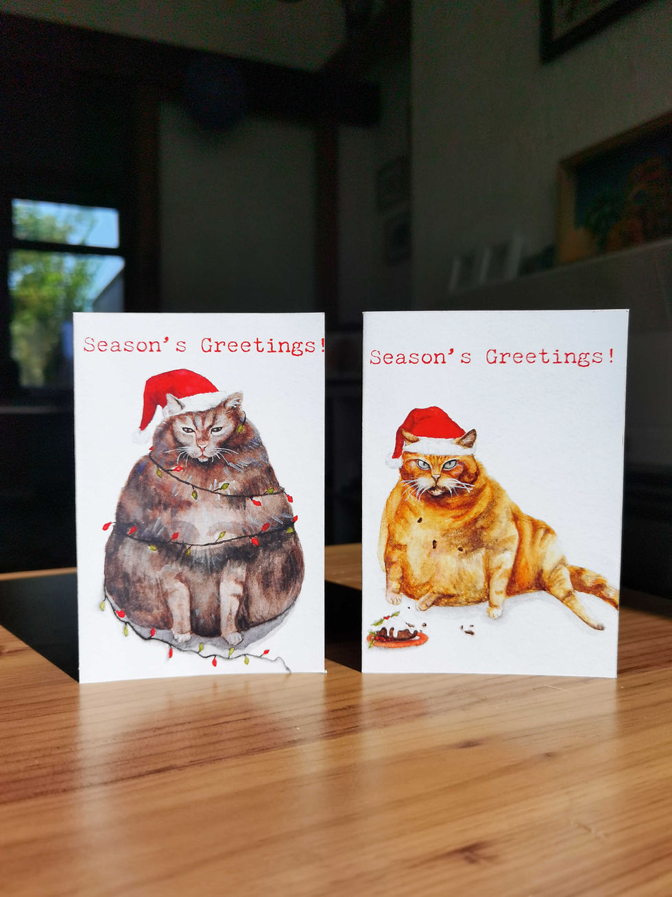 Thumbnail: seasonal cat greetings card illustration. Bristol illustrator. gift ideas. 