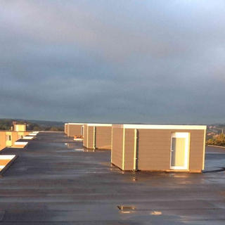 PIR-isolatie, roofing Sorema en sidings Eternit - appartementsgebouw Heverlee