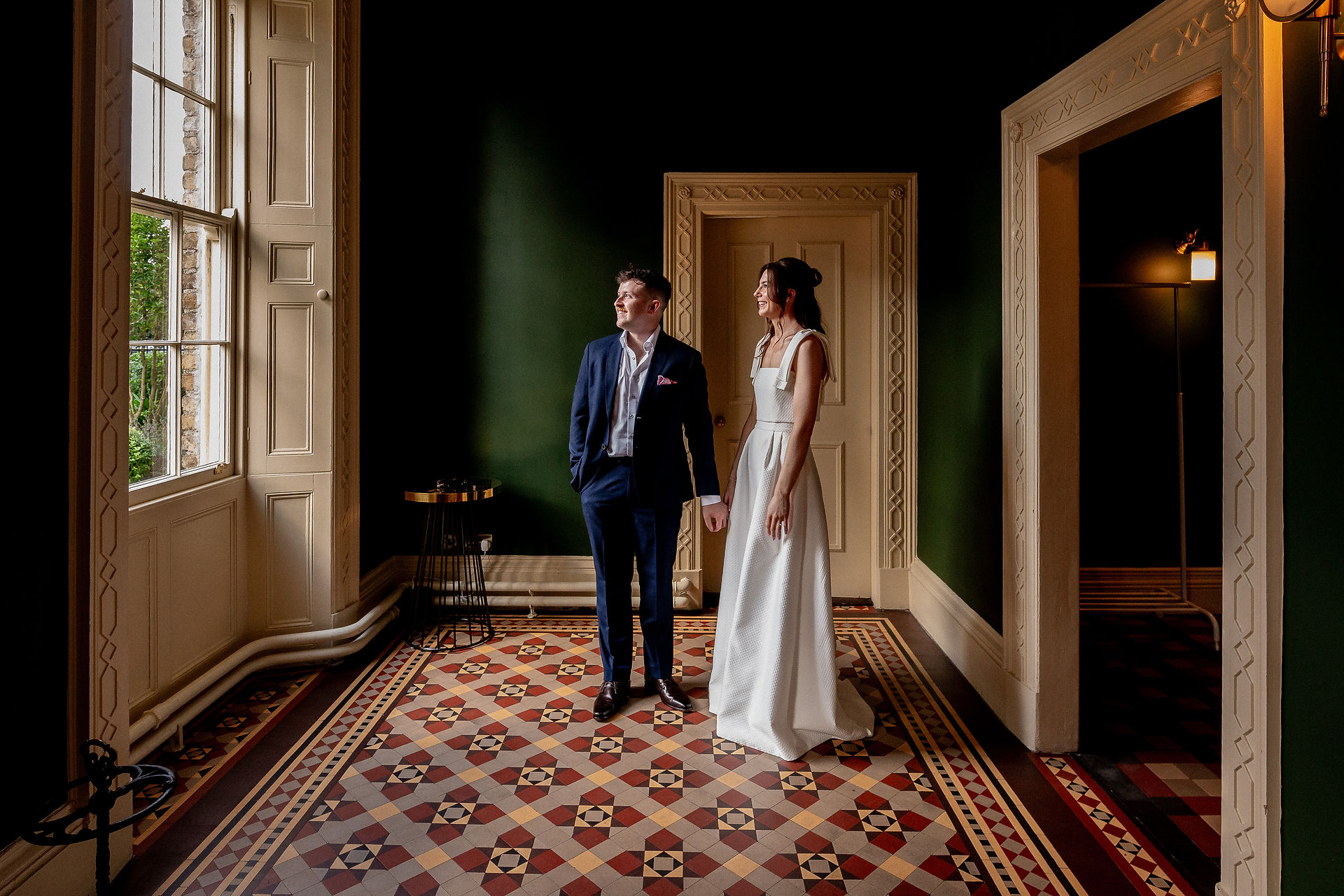 Faye and Gary in dappled light at The Abbey wedding venue