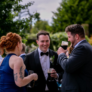 joey enjoys a pint with friends