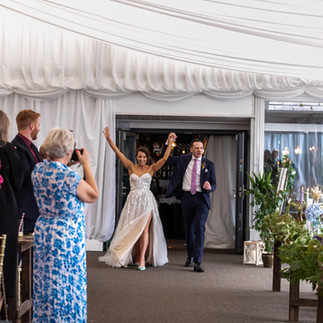 Marquee at Mountain View with wedding couple entering