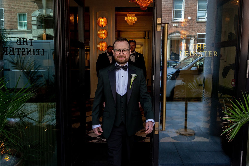 James looking like James Bond leaving the Leinster for his wedding ceremony