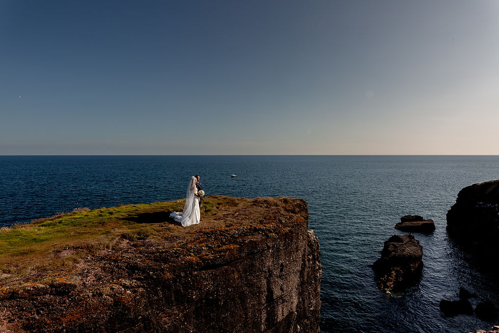 Wedding couple cliffs dunmore east.jpg