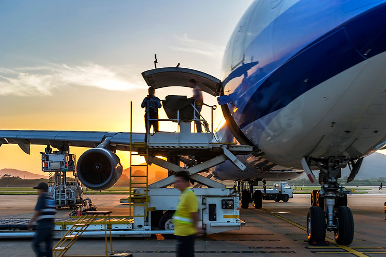 Airplane-near-terminal-186763256_1256x83
