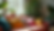 Eye-level view of a cozy corner with colorful cushions and plants