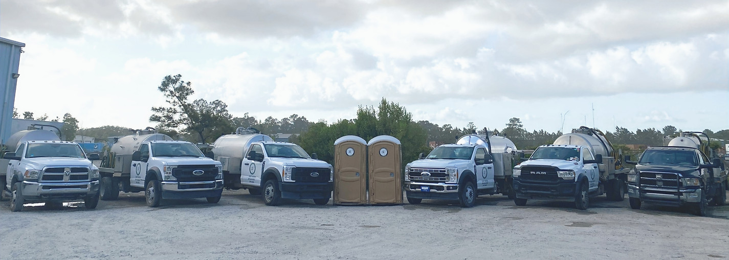 Southeastern Sanitation Savannah, Georgia and Atlanta, Georgia Trucks with Clouds in Background