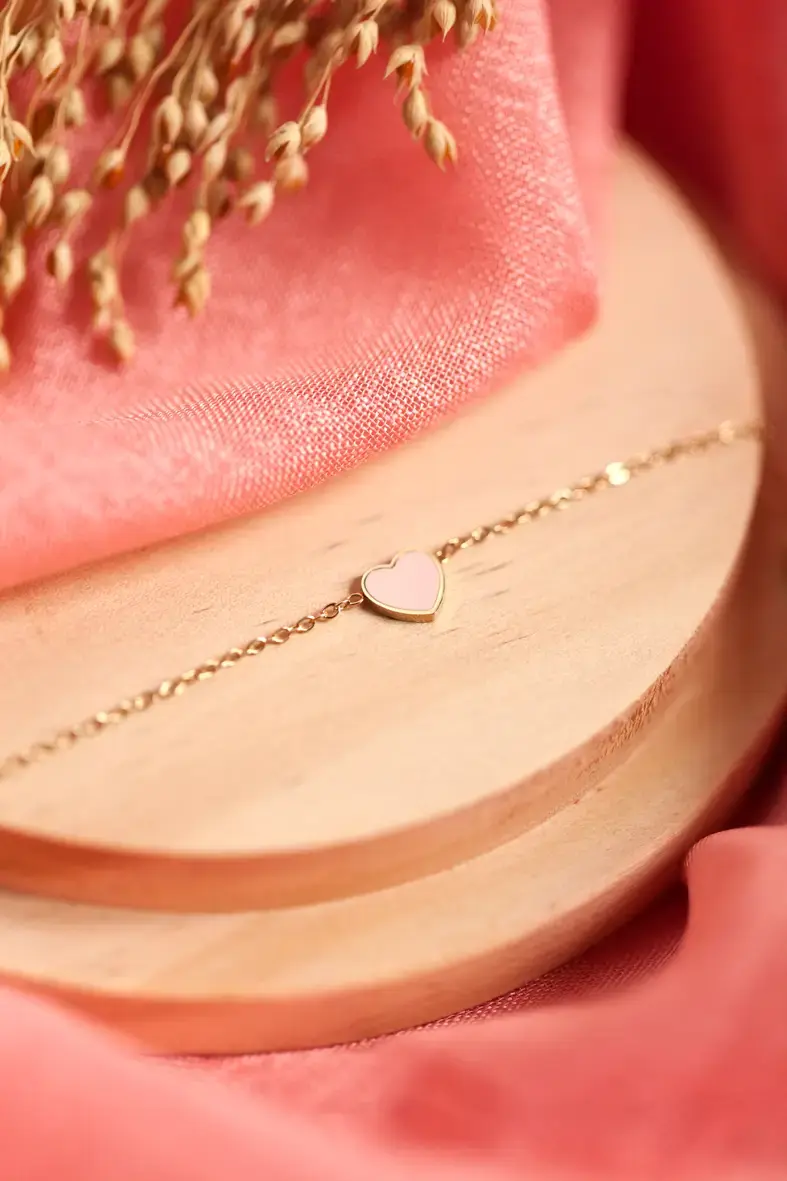 Miniature : bracelet ajustable pour enfant en acier inoxydable doré avec un coeur rose blanc