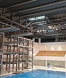 Three, five, and ten meter diving boards at Europasportpark indoor pool in Berlin.
