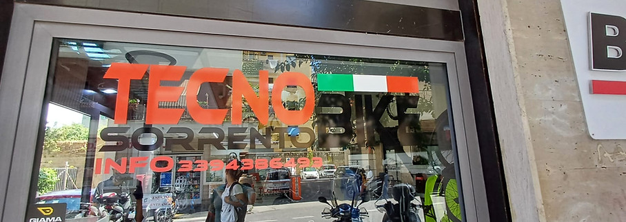 Tecnobike bike rental shop sign in Sorrento.