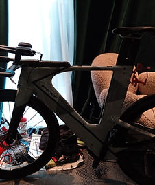 Triathlon bike set up inside a hotel room at The Cloud One Hotels