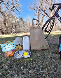 Healthy groceries from Sprouts Farmers Market beside Boulder Creek Path in Boulder, Colorado.