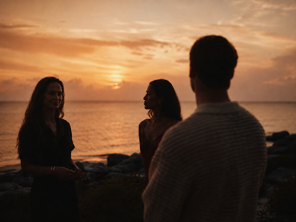 People discussing architecture & planning at sunset by the sea.