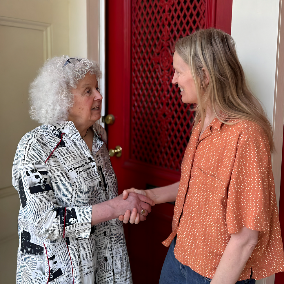 Edith Ajello speaking with a constituent
