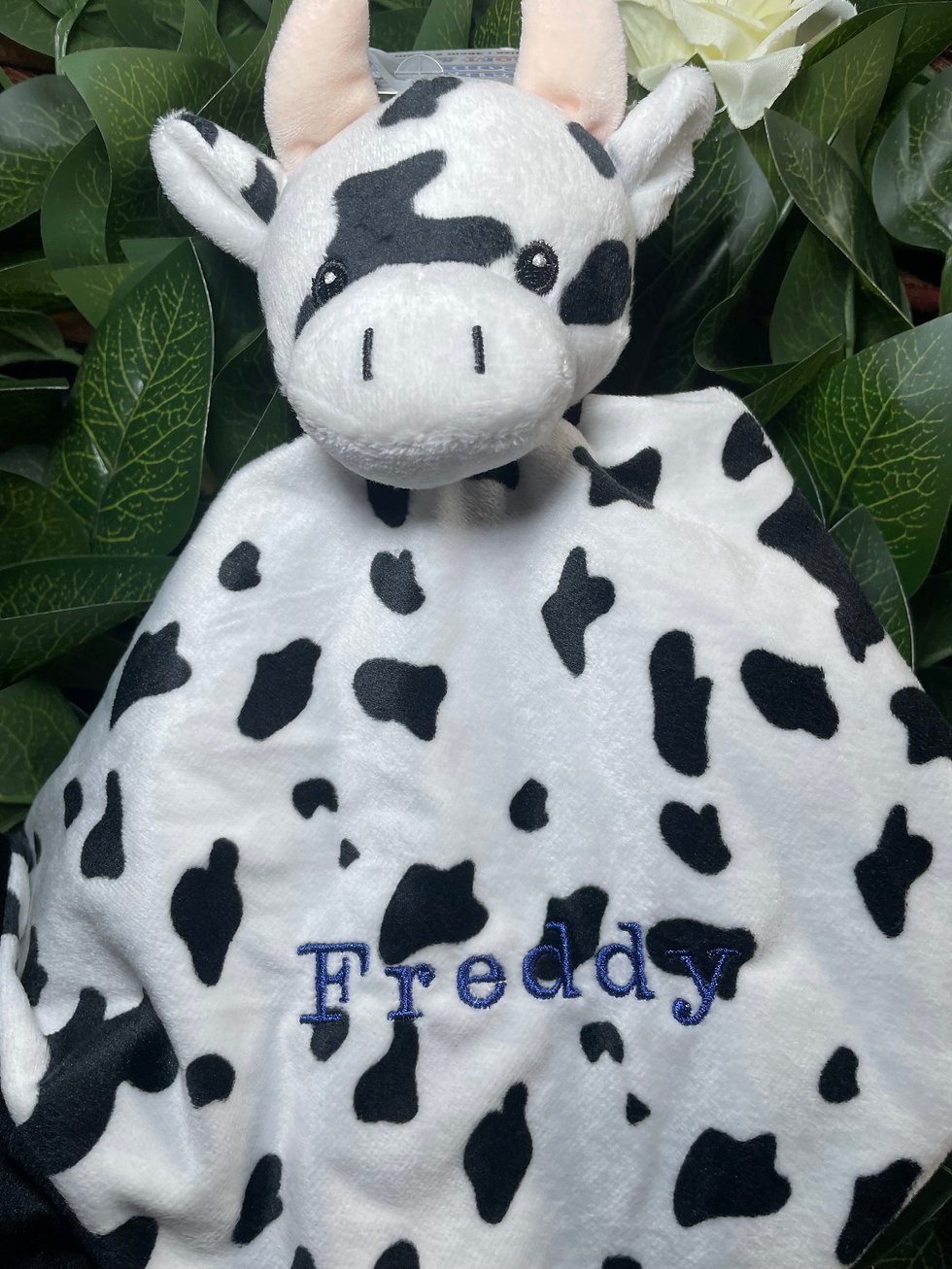 Unisex personalised embroidered baby comforter, in a cow design