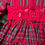 Thumbnail: Baby girl long sleeved red tartan Christmas dress, with flower detail