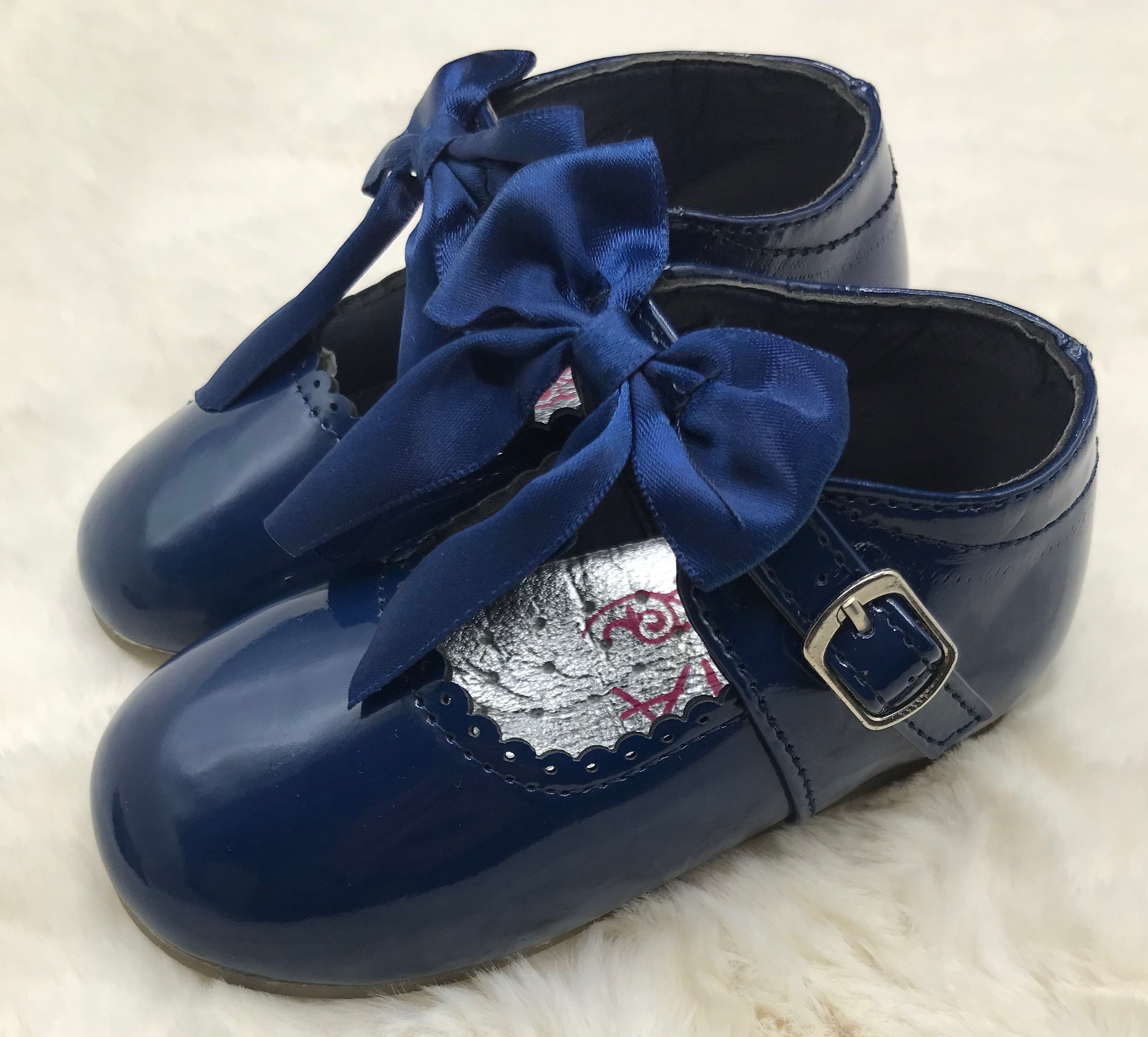 Girls Spanish style patent navy hard sole shoes