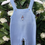 Thumbnail: Super cute baby boy blue knitted all in one romper, with Peter Rabbit inspired embroidery.
