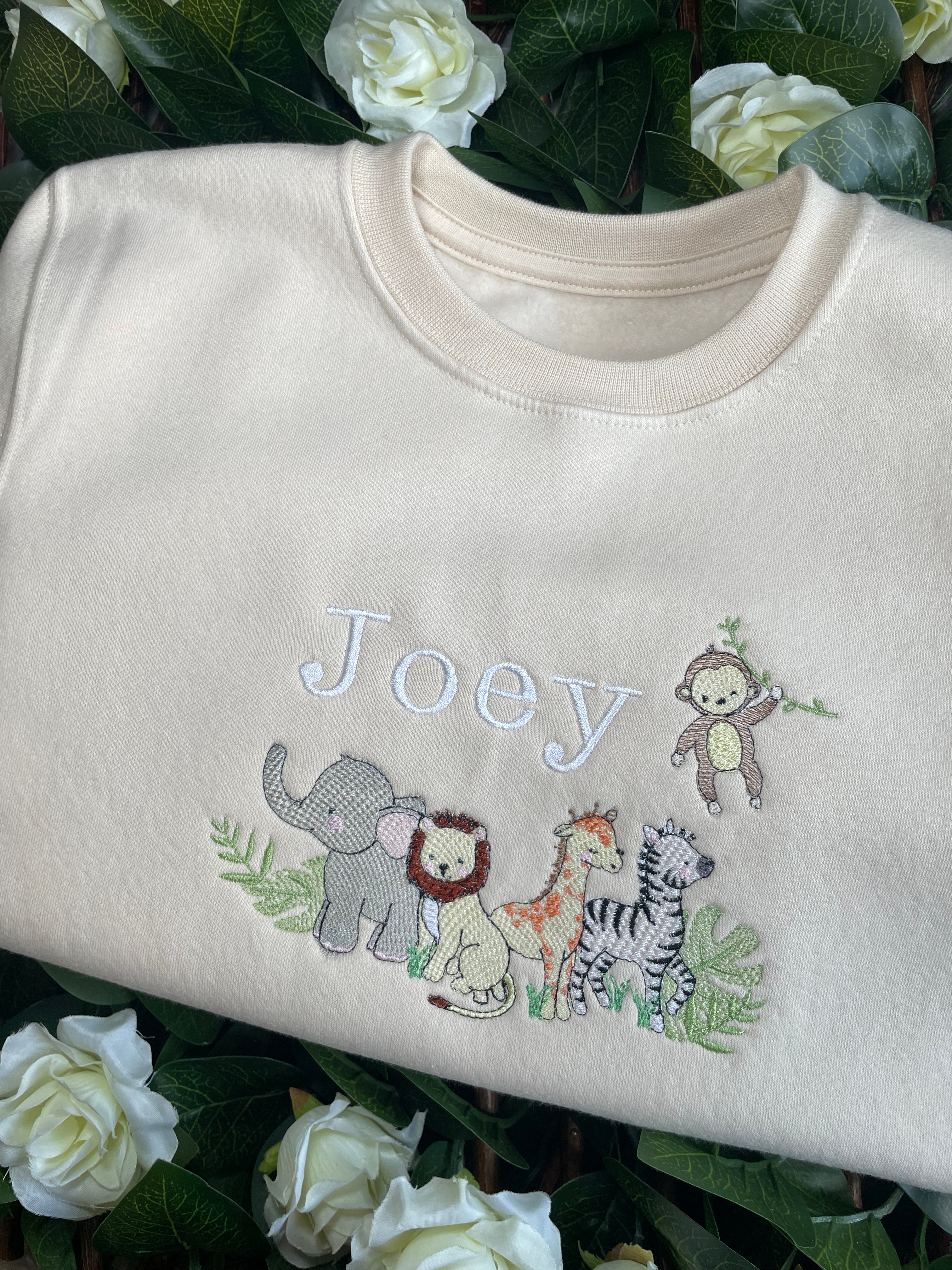 Kids personalised sweatshirts, with safari animal design.