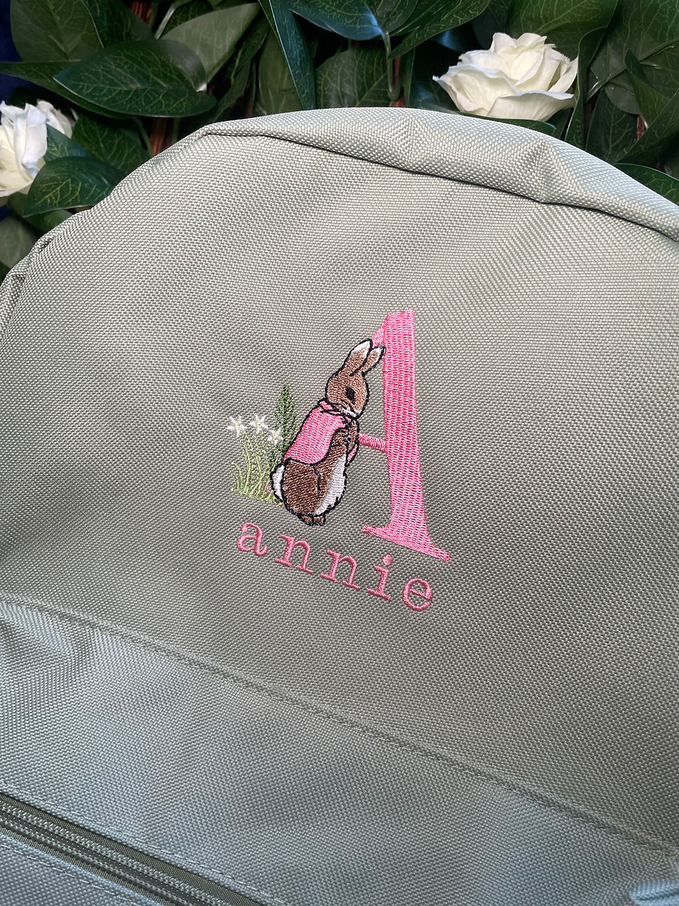 Thumbnail: Personalised children's backpack, embroidered with a Flopsy Bunny design and name