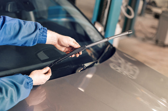 An image of a vehicle receiving preventative vehicle maintenance