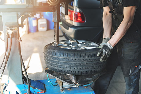 An image of a car's wheel being serviced
