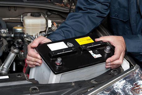 An image of a battery being installed into a car