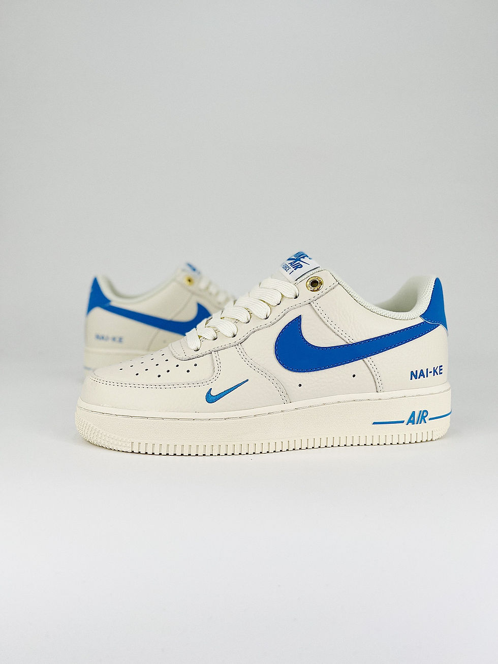 Thumbnail: NIKE AIR FORCE 1 LOW ‘NAI-KE’ BEIGE/ BLUE