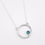Thumbnail: Silver Encircled pendant in transparent light turquoise