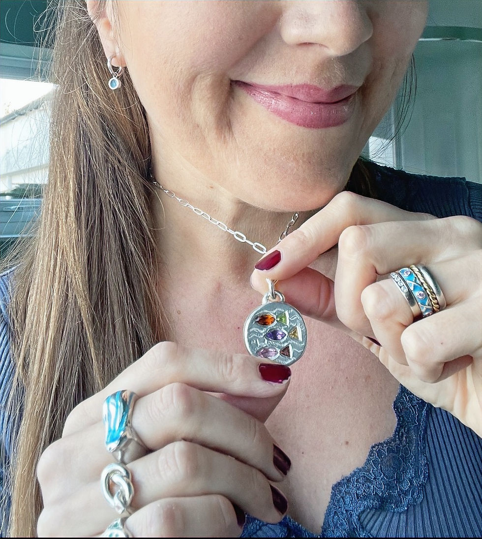 Thumbnail: Me wearing Wave ring with wave pendant fish side up & other pieces.