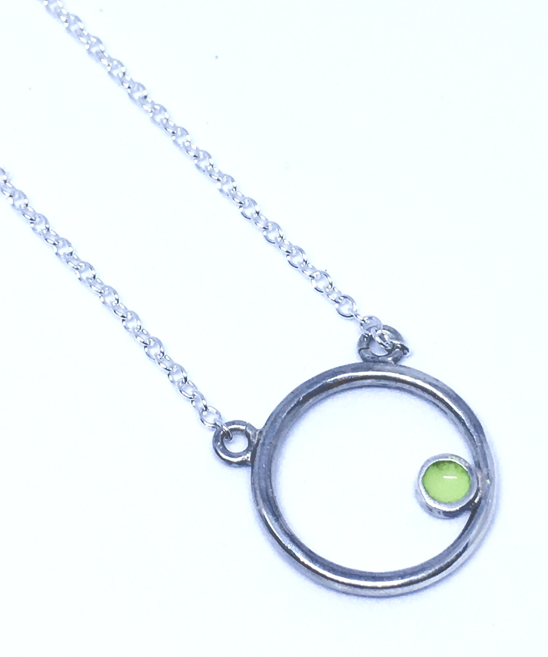 Silver Encircled pendant with lime green enamel dot