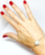 Silver stone bracelet with swiss blue topaz on wrist