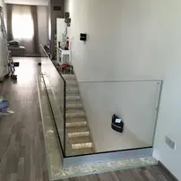 Glass Railing inside a home in Malta