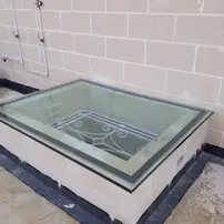 Walk on Glass with beautiful wrought iron design underneath in Malta