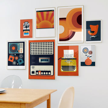 A gallery wall of colourful prints