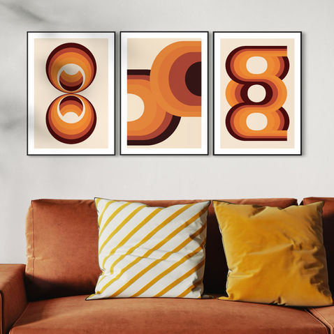Three 1970s inspired prints in a bright room