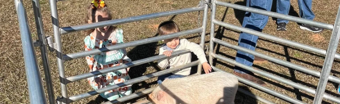 kid petting bettyJ.png