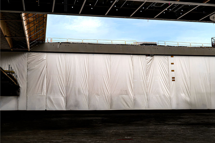 temporary enclosure system installed in open airport construction area